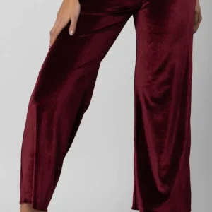 Pantaloni modello pantatuta donna bordeaux in velluto